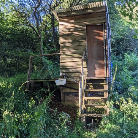 compost loo at wild camping campsite in Wales